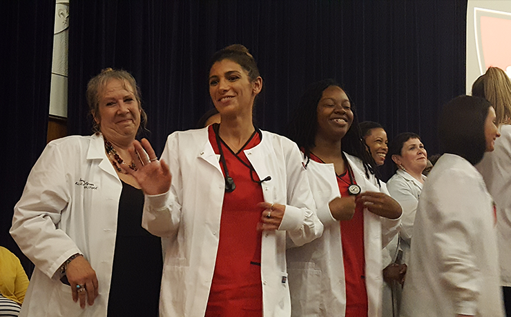 Nursing students in their clinical white coats