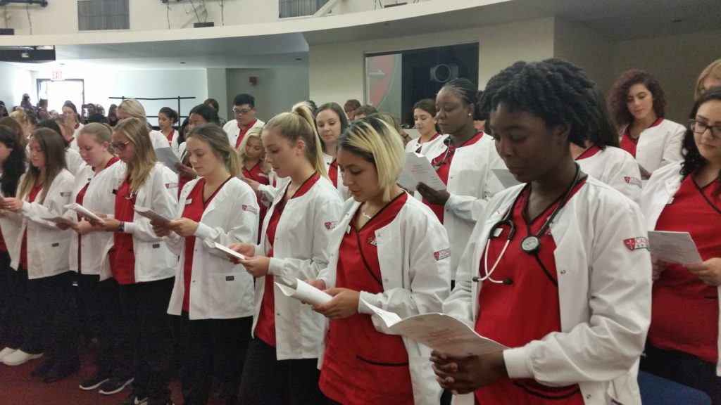 Junior Nursing Students Receiving White Coats for Start of Clinical