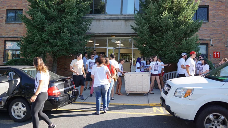 Freshmen moving in the dorm