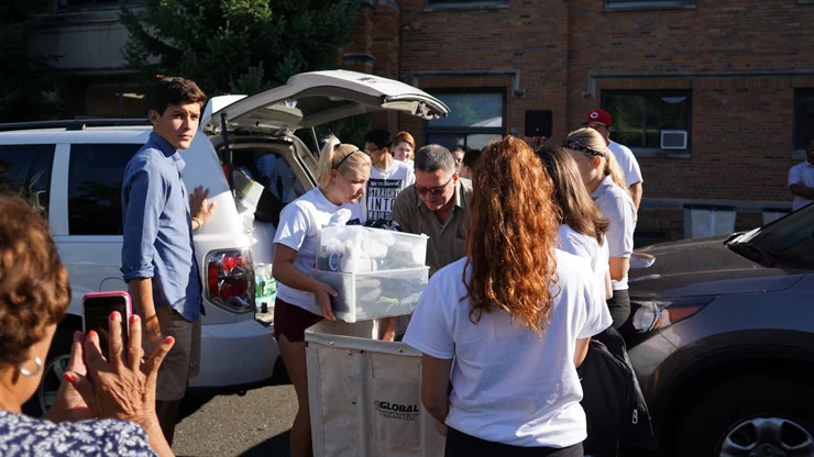 Freshmen moving in the dorm