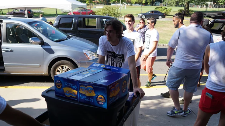 Freshmen moving in the dorm