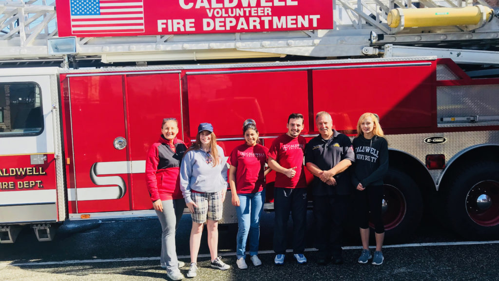 Caldwell Students volunteering in Caldwell Fire Department on Caldwell Day