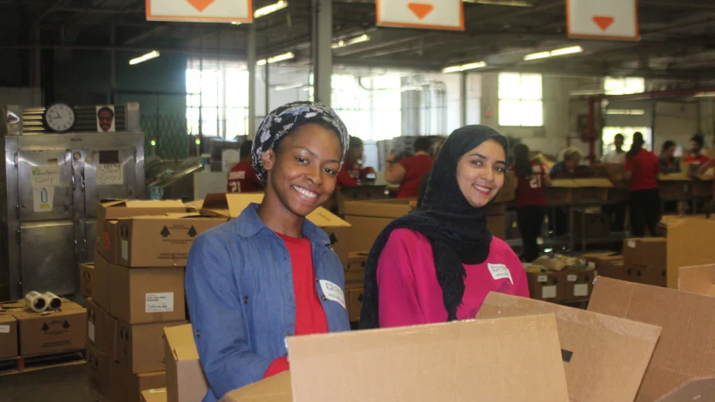 Caldwell Students volunteering in Food Bank on Caldwell Day