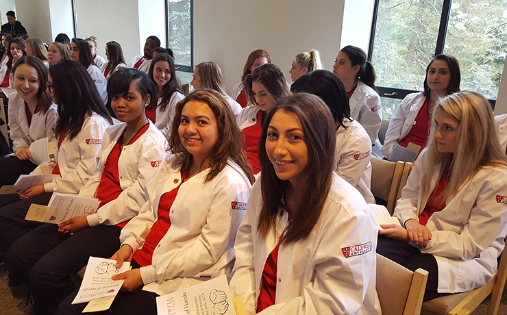 Caldwell University Nursing students participating in Nursing Blessing of Hands Ceremony.