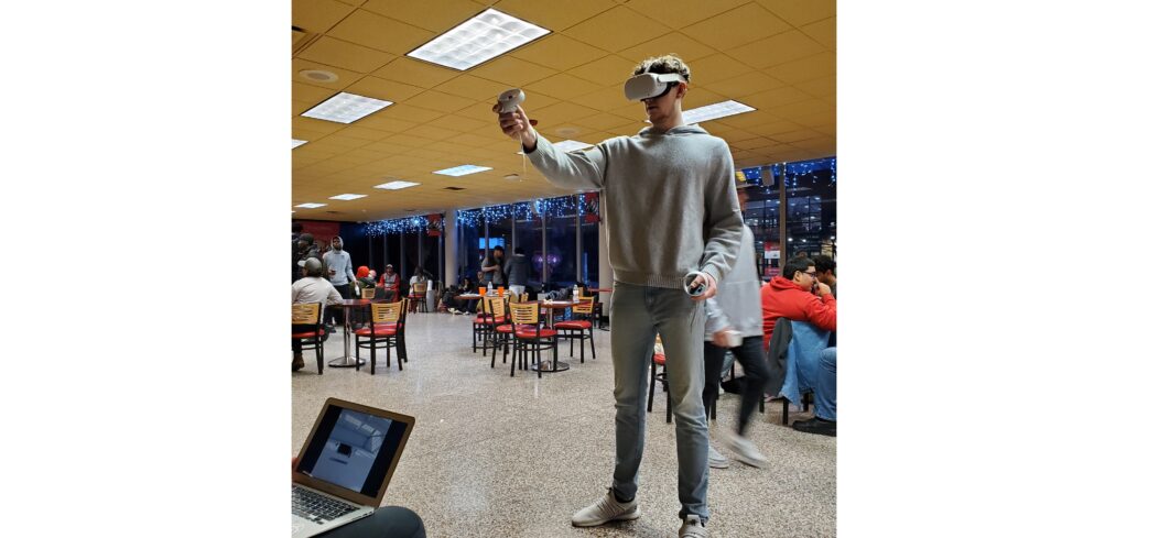 Giovanni Cessel of the Sports Marketing Club at the VR gaming tournament during the Cougar World Cup in the fall.
