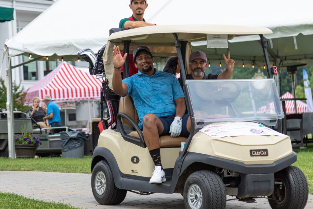 Golf men on their cart