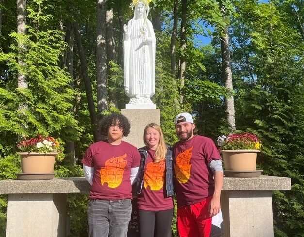 Caldwell student Leo Leberatto, Director of Campus Ministry Christina Bryant and Caldwell student Anthony Del Debbio at Dominican Preaching in Action Conference